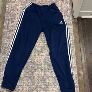 Vintage Adidas snap on track pants. Navy and white. Size L